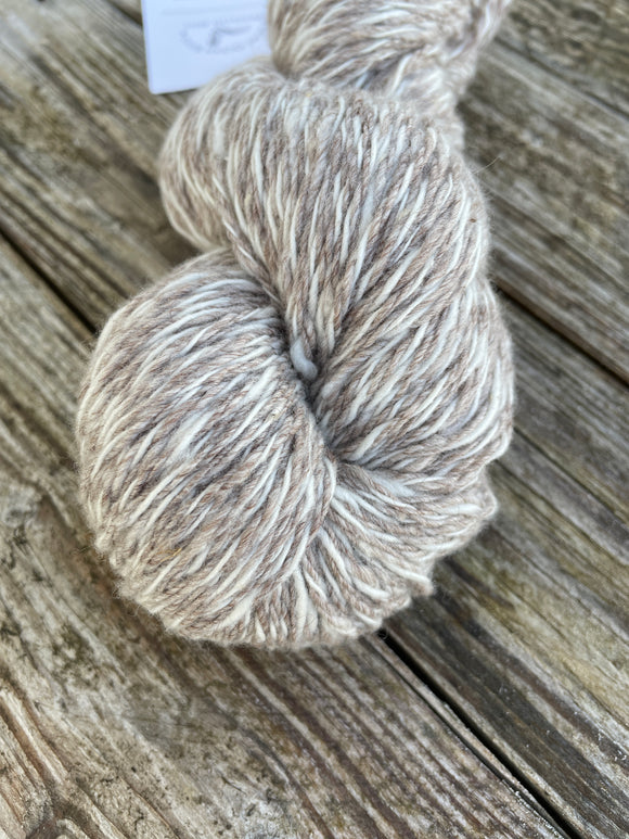 Image shows 1 skein of brown, brown white Anares yarn