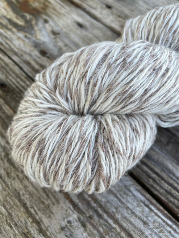 Image shows 1 skein of brown, white white Antares yarn